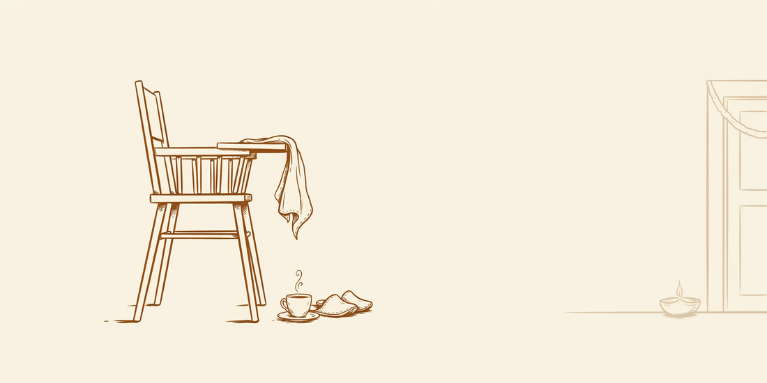 Line drawing of a feeding chair with a folded cloth and a cup of tea on cream.